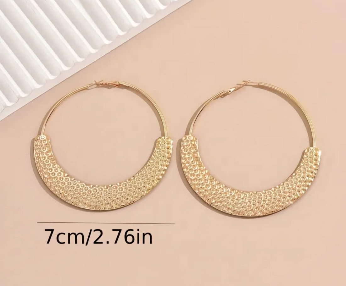 Gold hoop earing